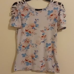White floral short sleeve tee.